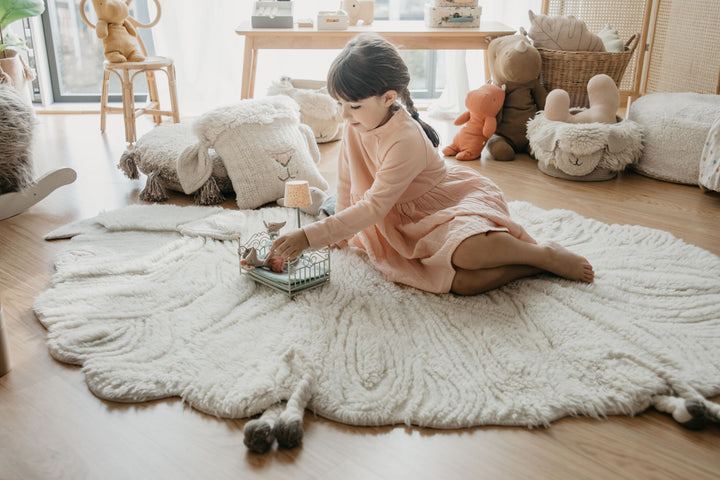 Tapis en laine de mouton à nez rose de Lorena Canals