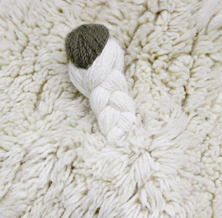 Tapis en laine de mouton à nez rose de Lorena Canals