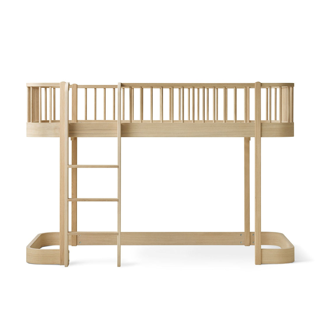 Oliver furniture oak children's loft bed with ladder on a white background