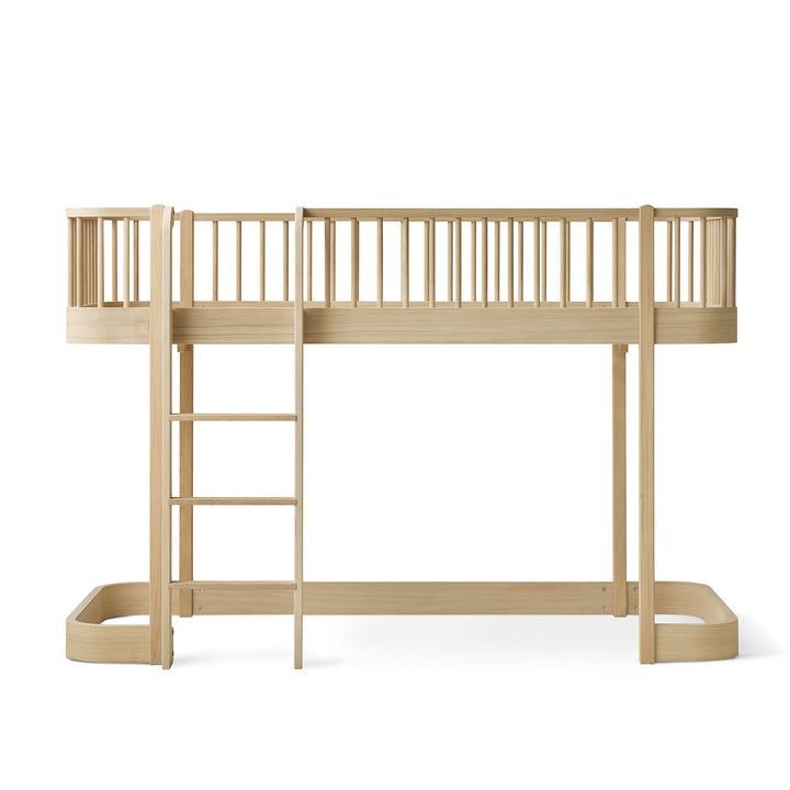Oliver furniture oak children's loft bed with ladder on a white background