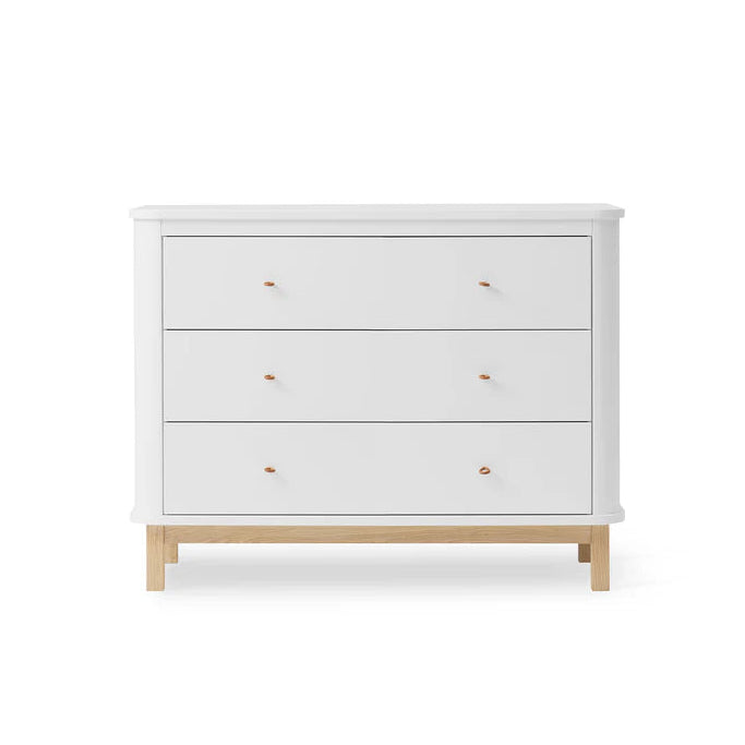 Oliver Furniture White dresser with Oak wooden legs on a white background