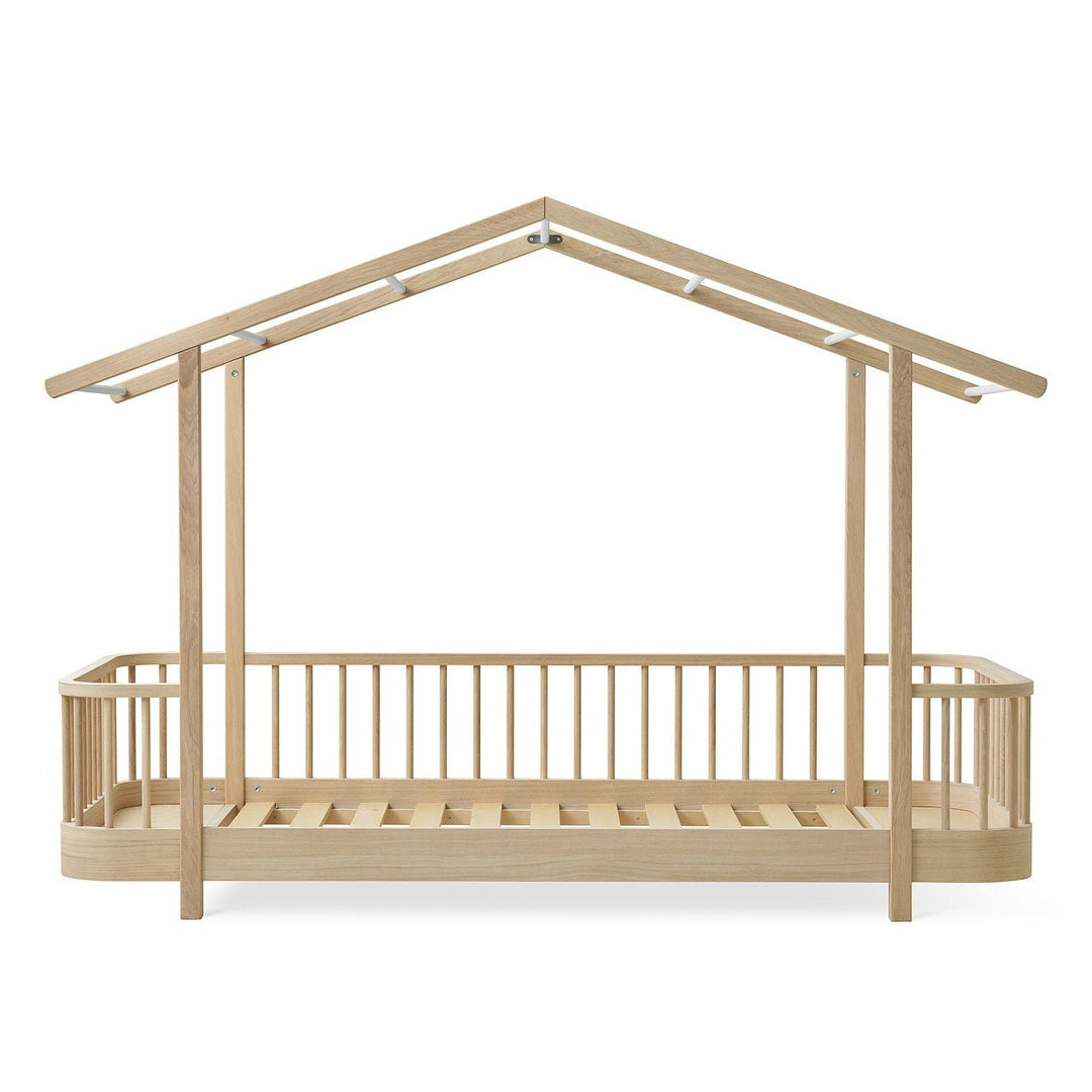 Oliver Furniture Wooden children's bed with a house-shaped roof on a white background