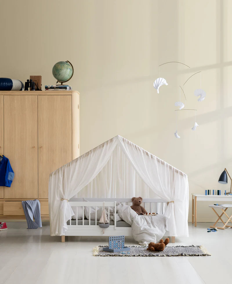 Oliver Furniture kids mini + house bed in white and oak colour with White canopy that drapes over the house bed