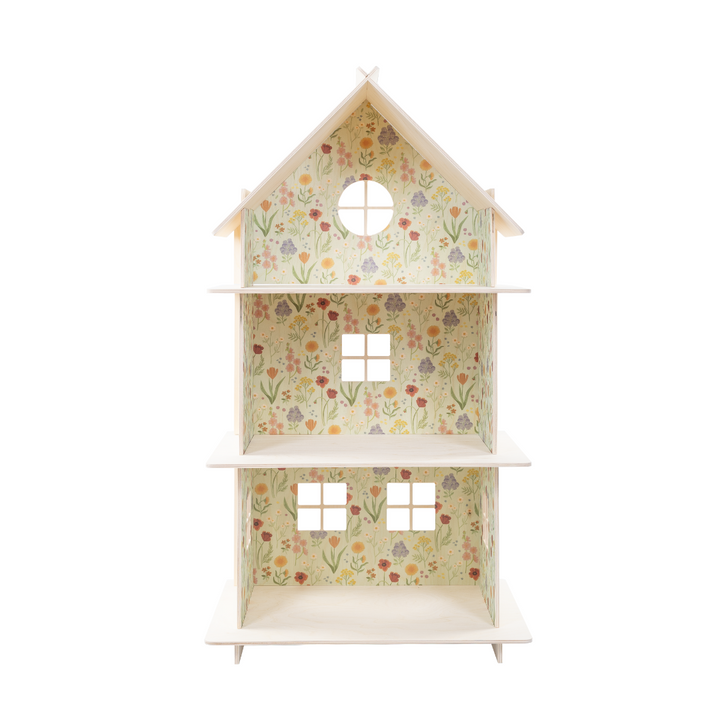Wooden dollhouse with a meadow floral design inside on the walls