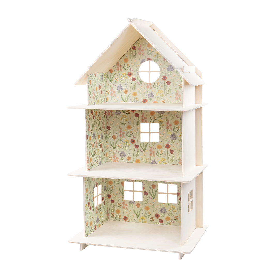 Small dollhouse with meadow floral pattern on a white background