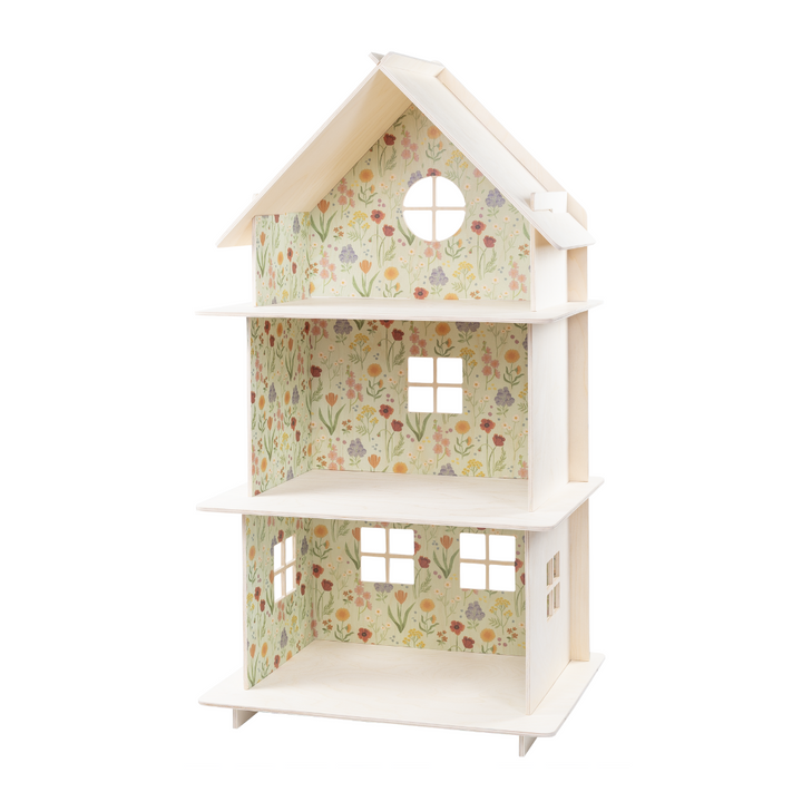 Small dollhouse with meadow floral pattern on a white background