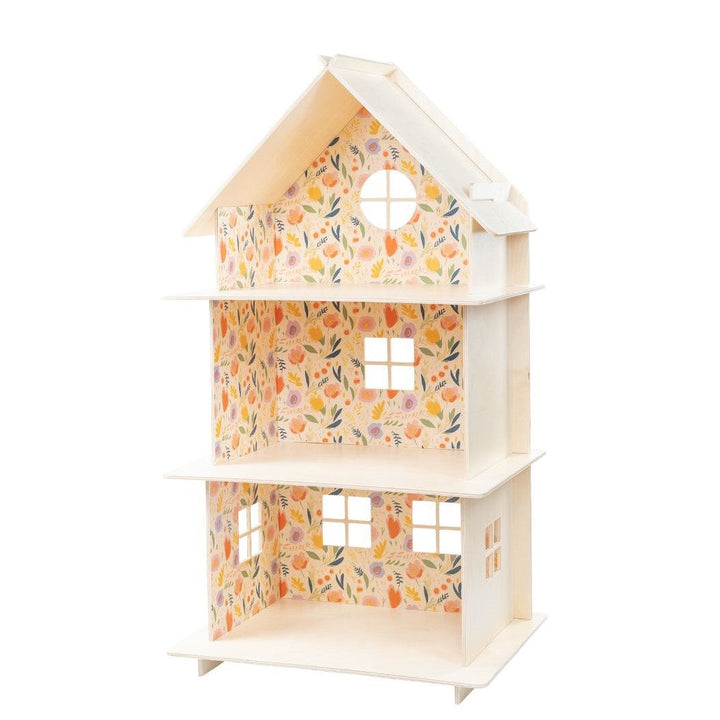 Floral-patterned dollhouse on a white background
