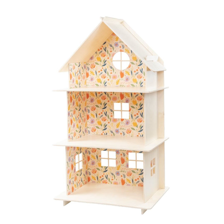 Floral-patterned dollhouse on a white background